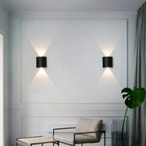 Applique murale moderne noire LED à éclairage haut et bas pour salon