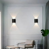 Applique murale moderne noire LED à éclairage haut et bas pour salon
