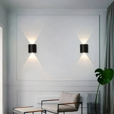 Applique murale moderne noire LED à éclairage haut et bas pour salon