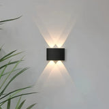 Applique murale moderne noire LED à éclairage haut et bas pour salon