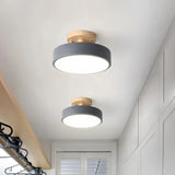 Plafonnier de couloir rond en bois et métal scandinave macaron