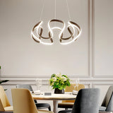 Suspension moderne torsadée en métal LED dimmable pour salle à manger