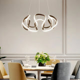 Suspension moderne torsadée en métal LED dimmable pour salle à manger