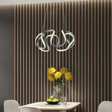 Suspension moderne torsadée en métal LED dimmable pour salle à manger