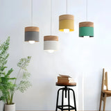 Suspension scandinave macaron cylindrique en bois et métal pour salle à manger