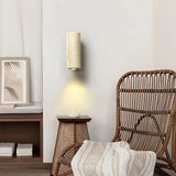 Applique en travertin jaune cylindrique de style wabi sabi pour chevet