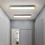 Plafonnier couloir LED ovale scandinave en bois et métal dimmable