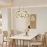 Suspension moderne torsadée en métal LED dimmable pour salle à manger