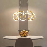 Suspension moderne torsadée en métal LED dimmable pour salle à manger
